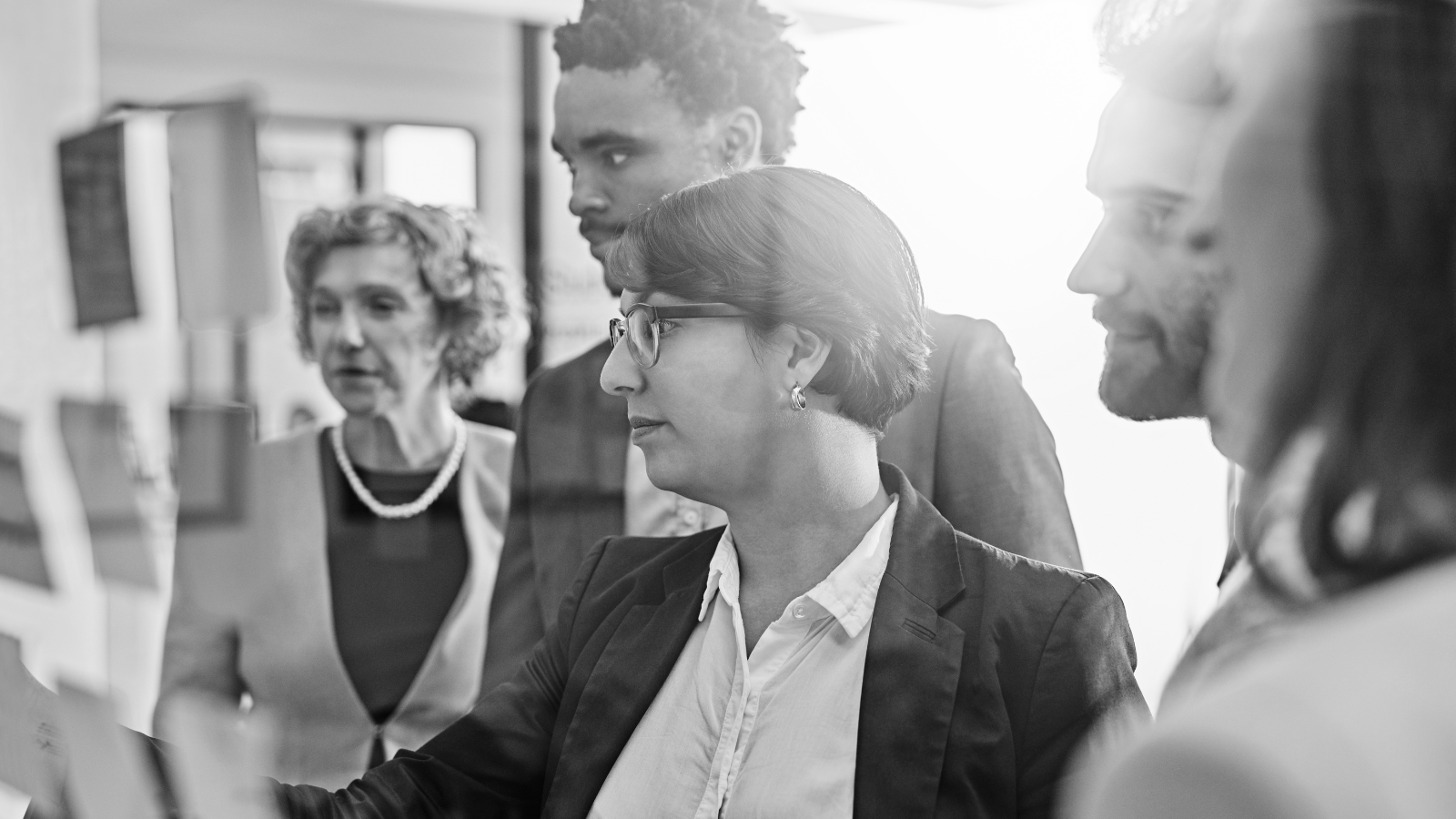 Group discussion during an AI implementation planning session focused on organisational transformation and business outcomes.